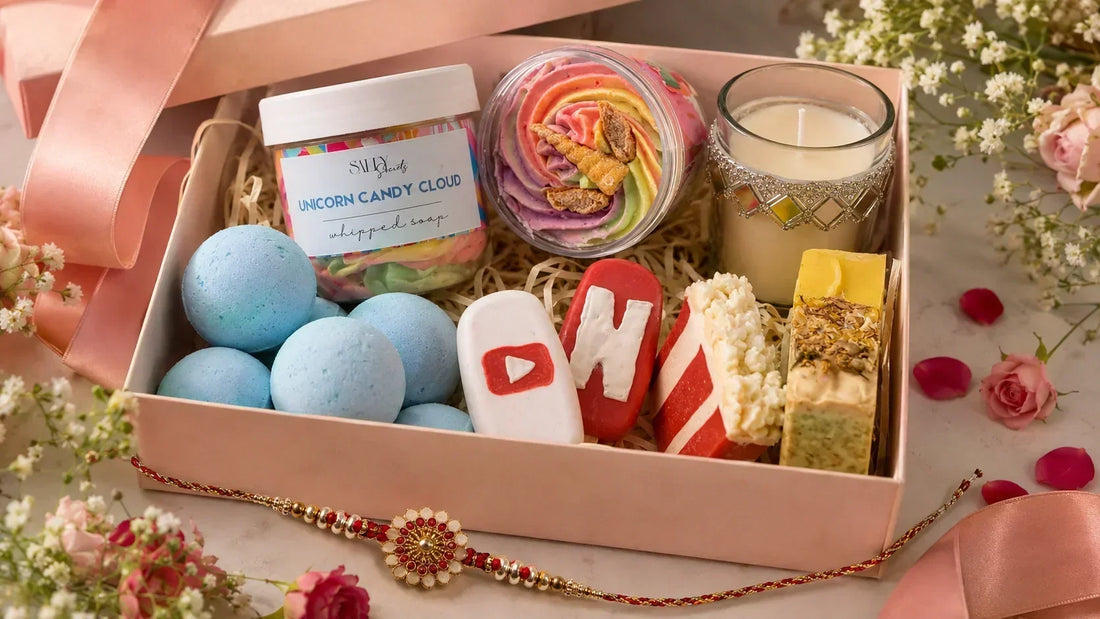 Salty Secrets Rakhi gift hamper with handmade soaps, whipped soap, bath bombs and candle arranged as a self-care gift for sister.